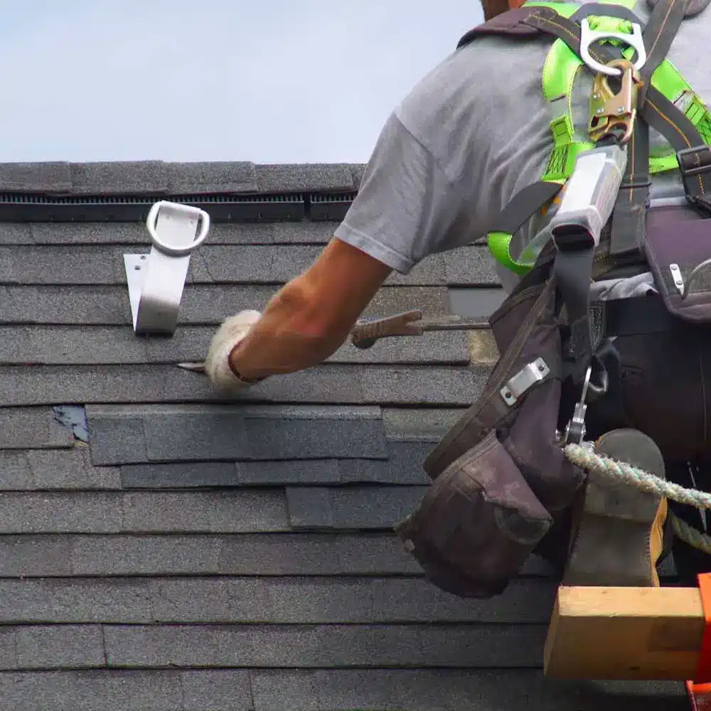 Handyman fixing roof